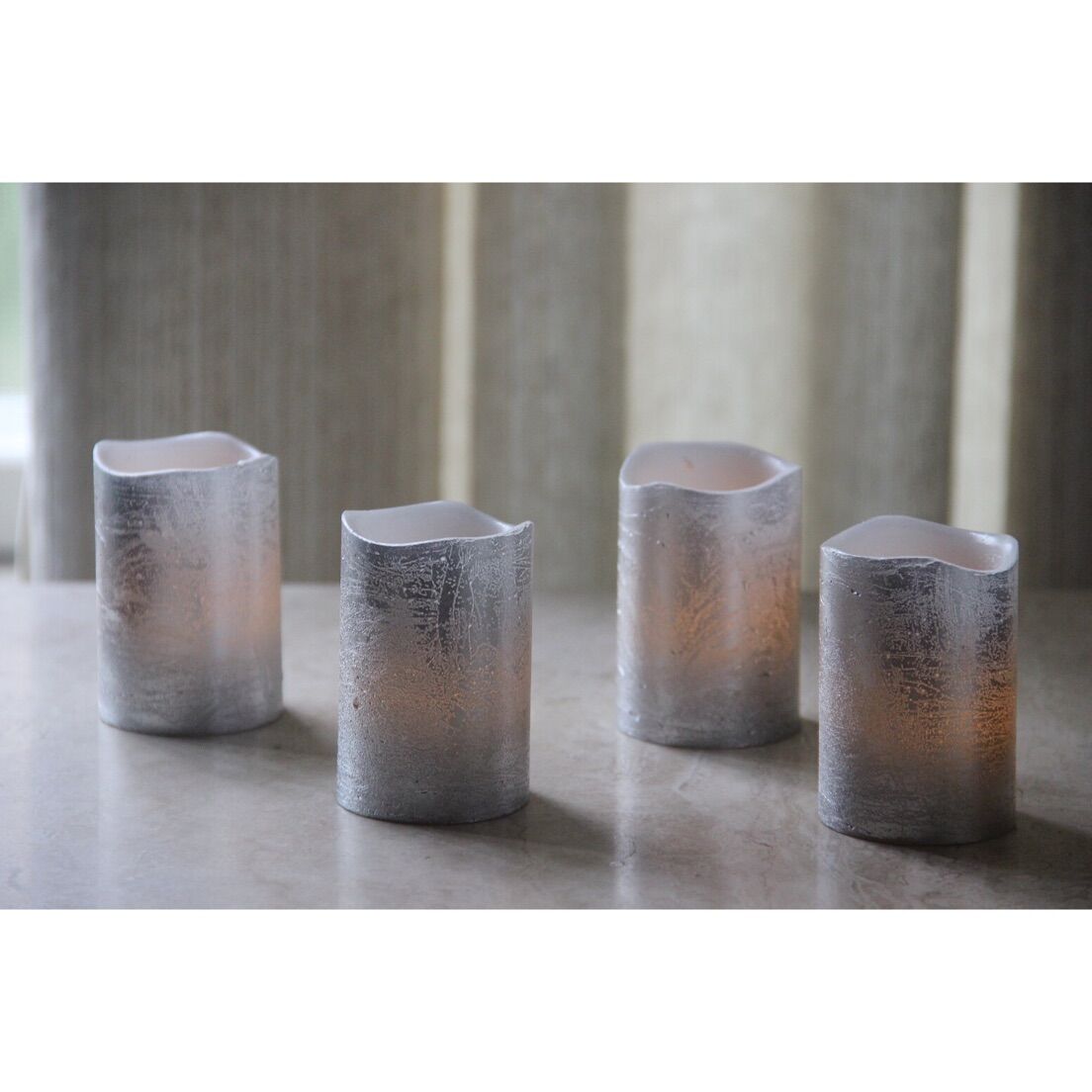 Thumbnail image for61040006SL SET OF 4 LED SILVER METALLIC VOTIVE CANDLES: 